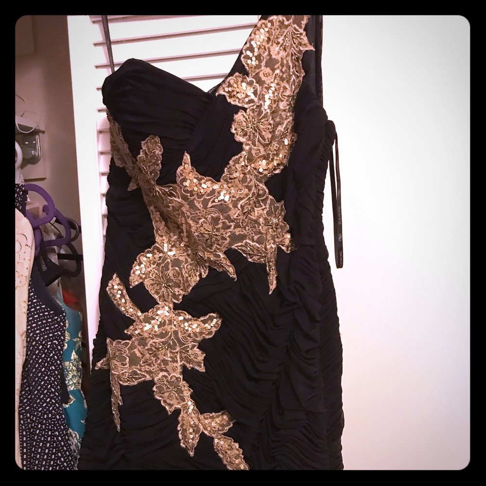Black dress with gold accents